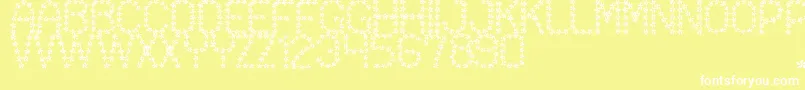 FloweredSt-Schriftart – Weiße Schriften auf gelbem Hintergrund