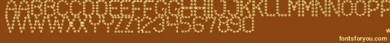 FloweredSt-fontti – keltaiset fontit ruskealla taustalla