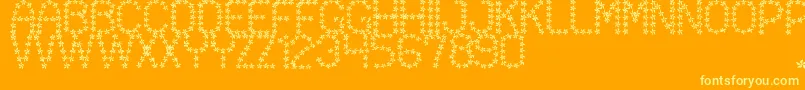 Fonte FloweredSt – fontes amarelas em um fundo laranja