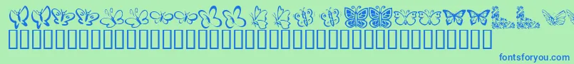 KrButterflies-fontti – siniset fontit vihreällä taustalla