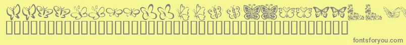 Police KrButterflies – polices grises sur fond jaune