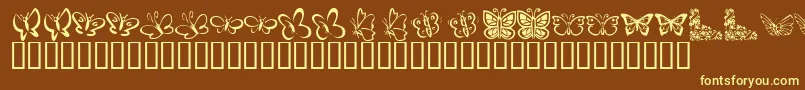 KrButterflies Font – Yellow Fonts on Brown Background