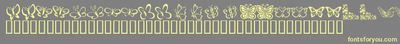 KrButterflies Font – Yellow Fonts on Gray Background