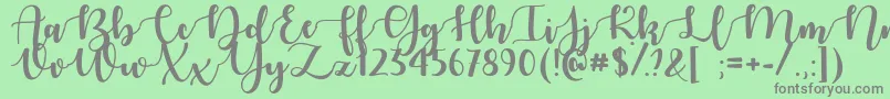 AutumnInNovember Font – Gray Fonts on Green Background