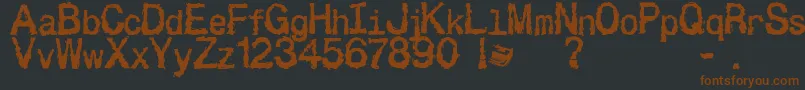 Besign-fontti – ruskeat fontit mustalla taustalla