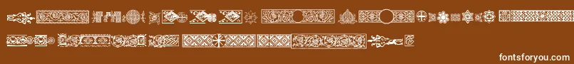Шрифт Pfornmtreasures2Regular – белые шрифты на коричневом фоне