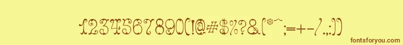 Figured Font – Brown Fonts on Yellow Background