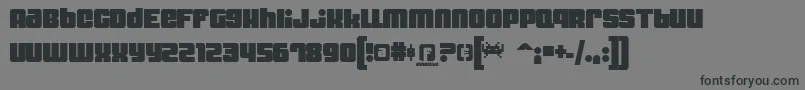 Dynomite Font – Black Fonts on Gray Background