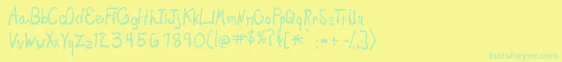 Newtoy-Schriftart – Grüne Schriften auf gelbem Hintergrund