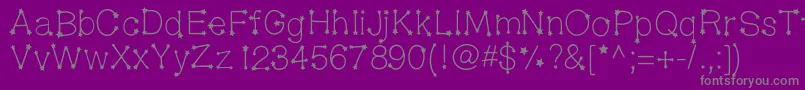 Midnightconstellations-fontti – harmaat kirjasimet violetilla taustalla