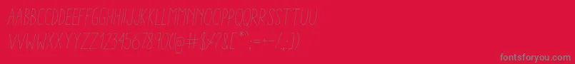 AracneCondensedLightItalic-Schriftart – Graue Schriften auf rotem Hintergrund
