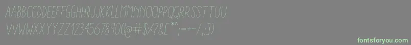 フォントAracneCondensedLightItalic – 灰色の背景に緑のフォント