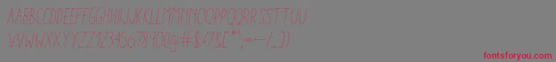 フォントAracneCondensedLightItalic – 赤い文字の灰色の背景