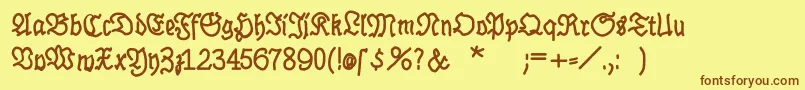 フォントBrokenhandBold – 茶色の文字が黄色の背景にあります。