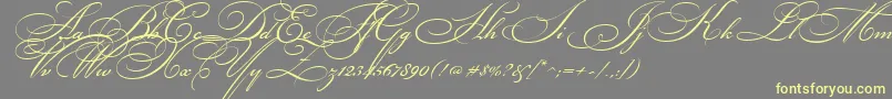 Bickhamscr2-Schriftart – Gelbe Schriften auf grauem Hintergrund