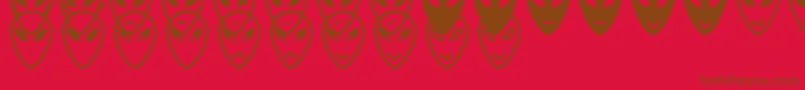 AlienFacesSt Font – Brown Fonts on Red Background
