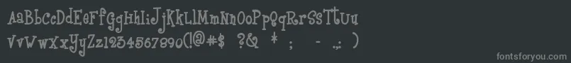 Boyzrgross-fontti – harmaat kirjasimet mustalla taustalla