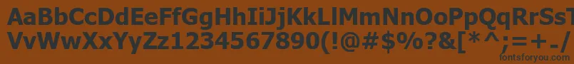 UkijInchikeBold Font – Black Fonts on Brown Background