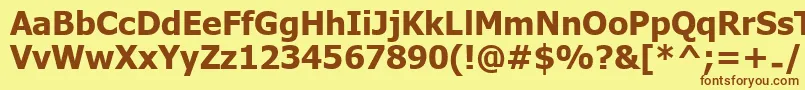 フォントUkijInchikeBold – 茶色の文字が黄色の背景にあります。