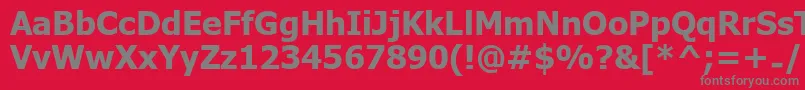 UkijInchikeBold-fontti – harmaat kirjasimet punaisella taustalla