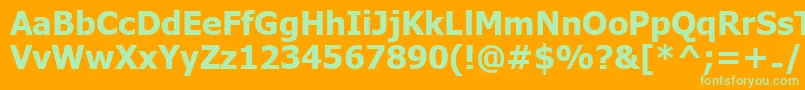 UkijInchikeBold-Schriftart – Grüne Schriften auf orangefarbenem Hintergrund