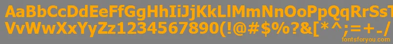 Шрифт UkijInchikeBold – оранжевые шрифты на сером фоне