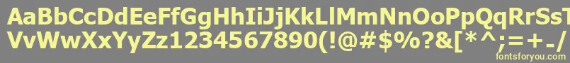UkijInchikeBold-Schriftart – Gelbe Schriften auf grauem Hintergrund