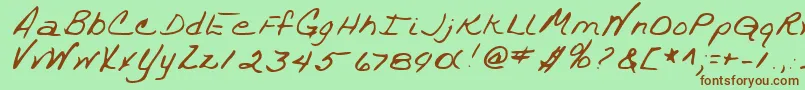 フォントTrixieshandRegular – 緑の背景に茶色のフォント