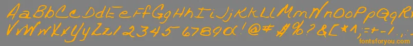 フォントTrixieshandRegular – オレンジの文字は灰色の背景にあります。