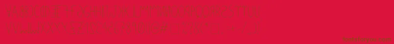 Anomalias-Schriftart – Braune Schriften auf rotem Hintergrund