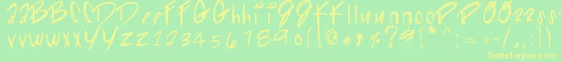 Gliiterkitty Font – Yellow Fonts on Green Background