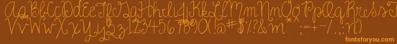 RoseCharming Font – Orange Fonts on Brown Background