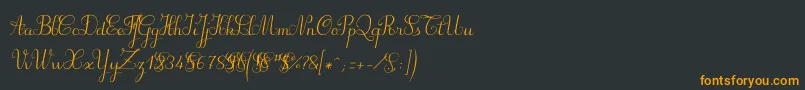 フォントSuillylatourdemo – 黒い背景にオレンジの文字