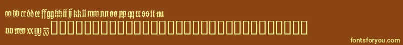 Fonte Heresy – fontes amarelas em um fundo marrom