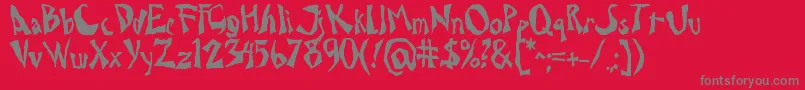 Fonte Drcaligari – fontes cinzas em um fundo vermelho