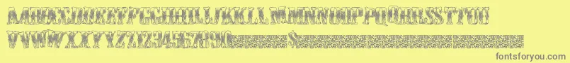 Cowboywould-Schriftart – Graue Schriften auf gelbem Hintergrund