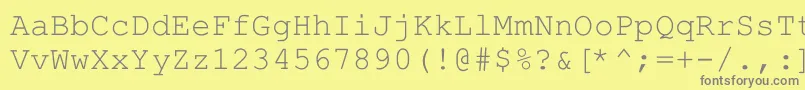 フォントHellascour – 黄色の背景に灰色の文字