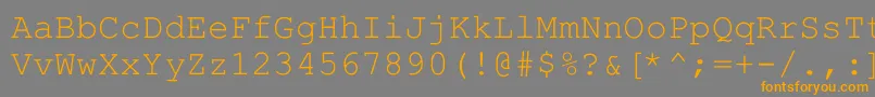 フォントHellascour – オレンジの文字は灰色の背景にあります。