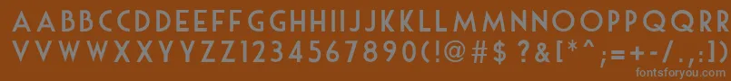 MouseDeco-fontti – harmaat kirjasimet ruskealla taustalla
