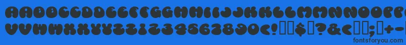 Cosmoscandy-Schriftart – Schwarze Schriften auf blauem Hintergrund