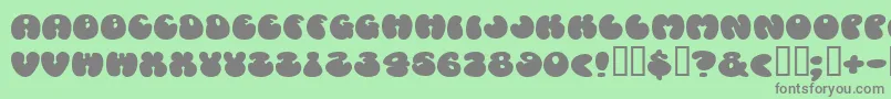 Cosmoscandy Font – Gray Fonts on Green Background