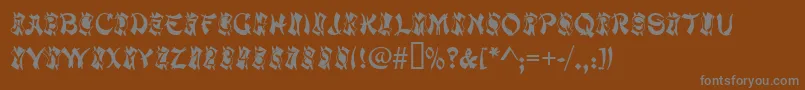 MacaoInitialsRegular Font – Gray Fonts on Brown Background