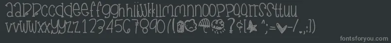 Junegloom-fontti – harmaat kirjasimet mustalla taustalla