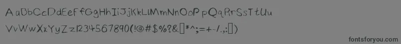 NinjyshandwritingRegular Font – Black Fonts on Gray Background