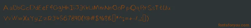 NinjyshandwritingRegular Font – Brown Fonts on Black Background