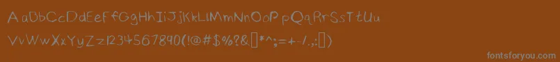 Шрифт NinjyshandwritingRegular – серые шрифты на коричневом фоне