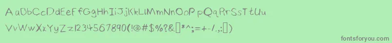 NinjyshandwritingRegular Font – Gray Fonts on Green Background