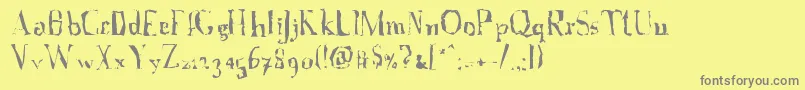 Czcionka AFontWithSerifs.Disordered – szare czcionki na żółtym tle