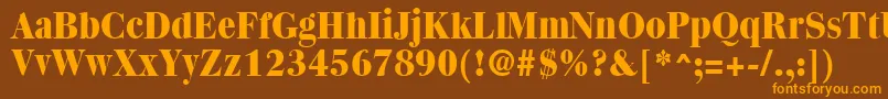 フォントQuantasExtraboldRegular – オレンジ色の文字が茶色の背景にあります。