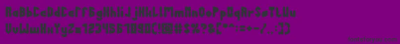 AntiqueRetroBold Font – Black Fonts on Purple Background